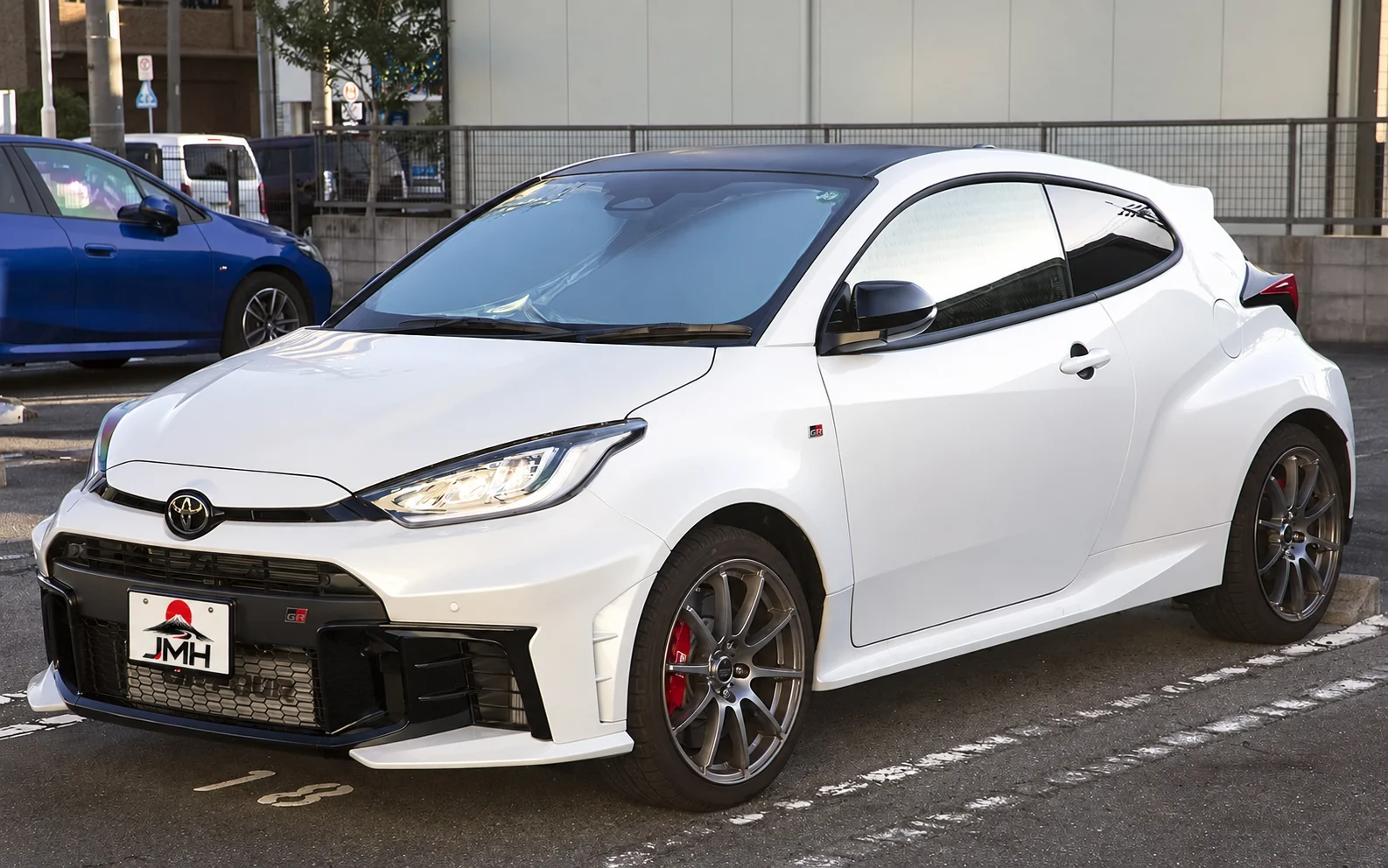 White Toyota GR Yaris RZ High Performance in Japan with a JMH display plate