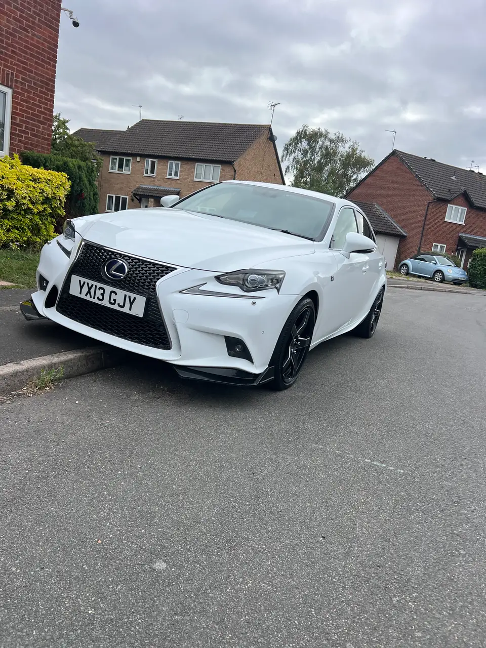 Founder’s own white 2013 Lexus IS 300h with personalised styling, front quarter