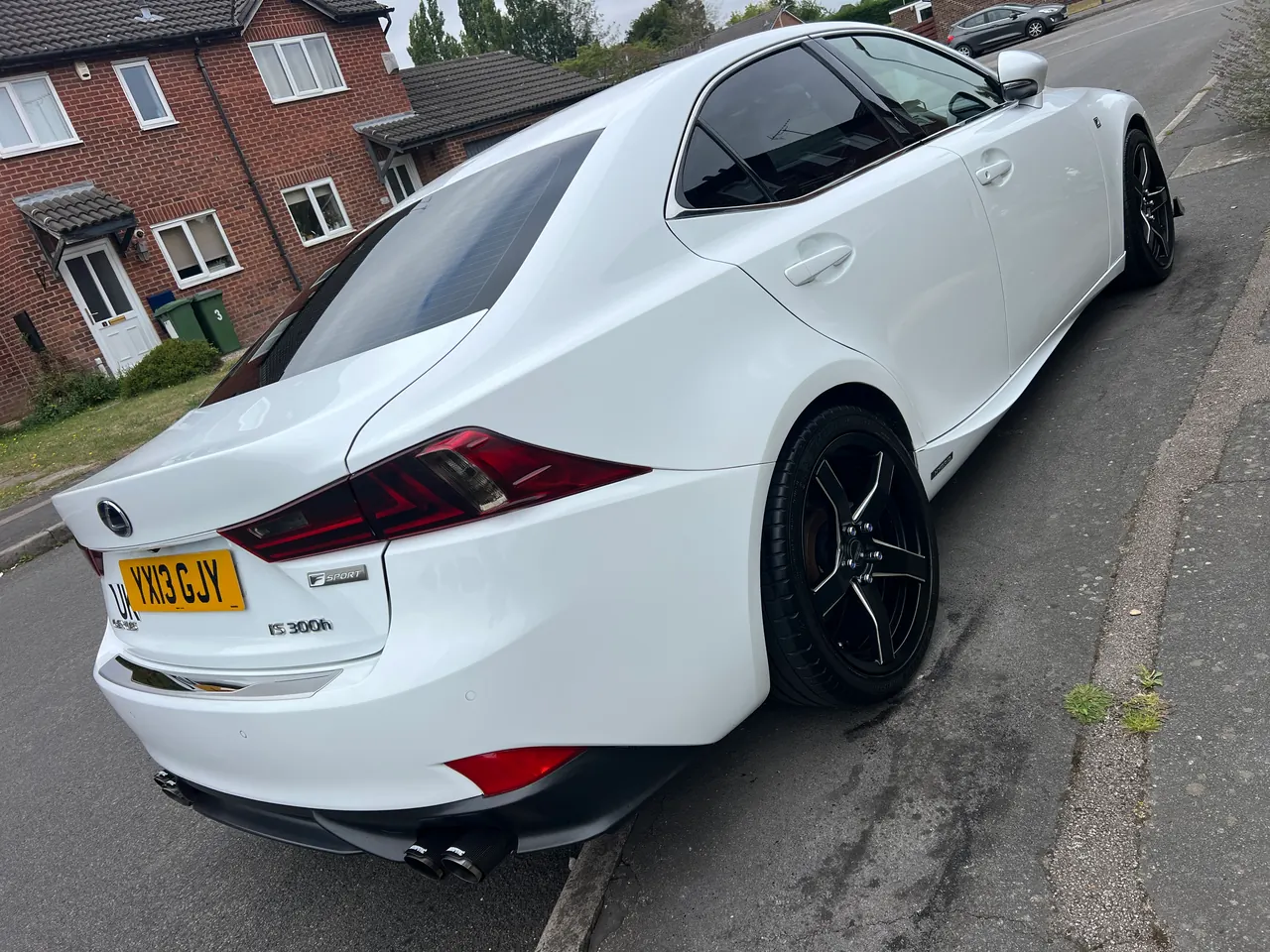 Founder’s own white 2013 Lexus IS 300h with personalised styling, rear quarter