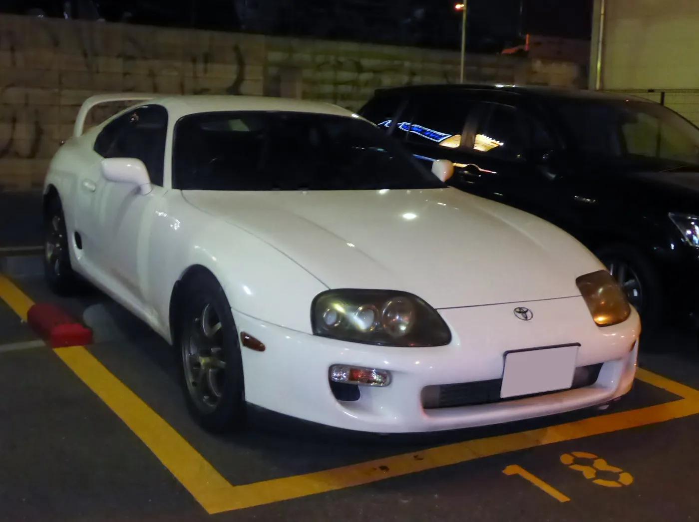 White Toyota Supra A80 parked at night